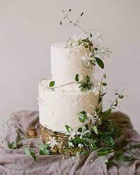 Love The Styling Of This Cake From A Beautiful Editorial By Almond Leaf Two Tiered White Romantic Wedding Cake Wedding Cake Toppers Wedding Cakes With Flowers