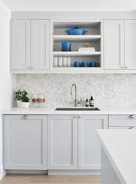 small marble herringbone backsplash