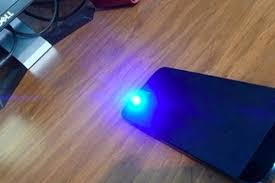 I Thought He Was About To Ruin His New Iphone But What He Did Instead Is Pretty Spectacular Diy Black Light Smartphone Hacks Black Light