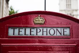 close-up of vintage red telephone boxes