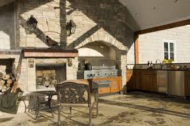 Elegant appearance, maybe you have to spend a little money. Outdoor Bbq And Kitchen Love The Shadow Of The Roofline Architectural Feature Patio Fireplace Small Outdoor Kitchen Design Small Outdoor Patios