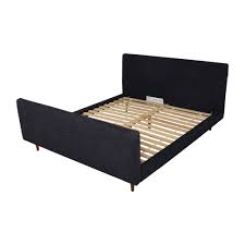 Extending far beyond the high tufted headboard, its thickly padded upholstery graces the rails and footboard storage bench for comfort. 62 Off West Elm West Elm Queen Upholstered Bed With Footboard Beds