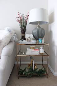 The retailer offers items individually or in convenient sets. West Elm Lookalike Side Table Holiday Decor Pineapple Book Ends Raymour Flanigan Side Table Lamp Pom Pom Blanket Farmhouse Holiday Decor Ideas Style Cusp