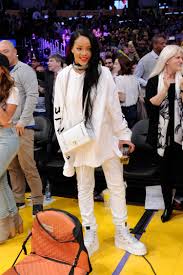 Rihanna Wears Dior Handbag As A Necklace At Basketball Game Glamour