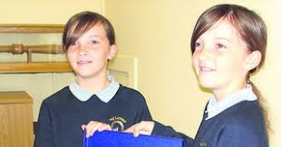 Twin sisters honoured for caring work