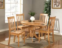 What To Consider When Buying A Wood Dining Table Round Kitchen Table Wooden Kitchen Table Kitchen Table Settings