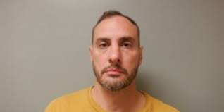 Student conduct director accused of crashing into house while driving drunk