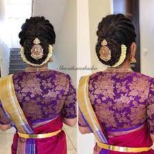 What A Beautiful Low Bun With Real Flower Gajra Juda Pin Care However Should Be Taken Before Adopting Su Bridal Hair Buns Saree Hairstyles Indian Hairstyles
