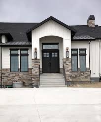 Black And White House Exterior Ideas A Barndominium Allows You To Board Rustic Environments With Fashionable Comforts After You Have Modern Farmhouse Exterior Exterior House Colors House Exterior