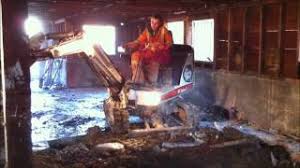 In weighing my ideas for adding basement space to my existing home, i was wondering if anyone had their home lifted and added a basement it is still going to be really expensive but it might be easier to dig and install a new foundation with basement and then lift house and move to new location. Lifting A House And Excavating The Basement Youtube