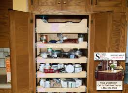 In a small kitchen, where every inch of space is prime real estate, creating 3 pullout shelves can double the capacity and usable space of the cabinet. Pull Out Cupboard Shelves