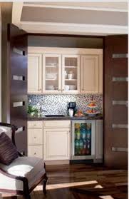 hidden kitchenette in master suite