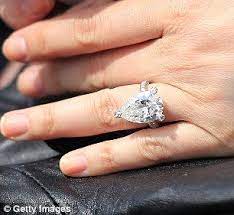 Who S Playing Again All Eyes Are On Holly Valance At The Tennis As She Livens Up Her Outfit With Her Giant Engagement Ring Giant Engagement Ring Huge Engagement Rings Celebrity Engagement