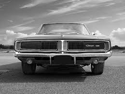 Black 1969 Dodge Charger The Front End Of A Vintage 1969 Dodge Charger In Black And White Showing The Classic Grille 1969 Dodge Charger Dodge Charger Dodge