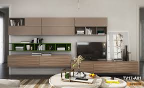 A minimal wall display in which the tv is the main focus of the room and is either surrounded by only a few tiny objects or by nothing at all is a great way to hang your tv on the wall without creating a distracting display. Modern Gray Wall Tv Stand Design Tv17 A01