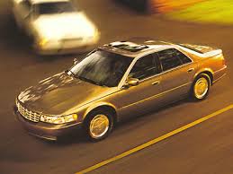 Image result for Medium Gold 1998 Town Car