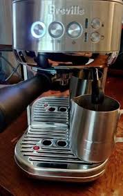 The promise of a freshly brewed latte—or maybe. The Bambino Plus Breville