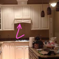But if your stove is a major feature of your kitchen you'd be better off to have a nice hood, whether stainless or wood. What Is The Cabinet Covering A Range Hood Called Home Improvement Stack Exchange