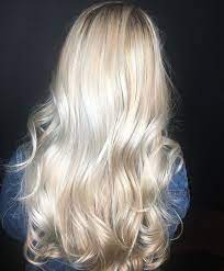 A cool, light blue or pale grey overlay is a modern way to do light blonde hair color. Pretty Really Light Blonde Hair Color Light Blonde Hair Light Hair Color Hair Styles