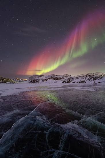 Northern Lights above a frozen lake