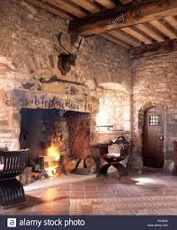 Lighted Fire In Fireplace In A Medieval Style Hall In Penhow Castle F5j5nx Jpg 1072 1390 Medieval Home Decor Medieval Bedroom Bedroom Fireplace
