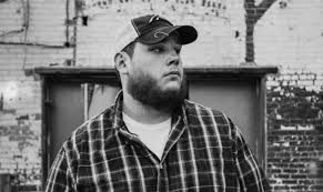We locked eyes over whiskey on ice, started talking 'bout us again. Song Review Luke Combs Hurricane Saving Country Music