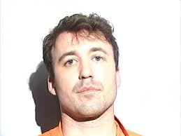 Local doctor indicted for allegedly setting another doctor's home