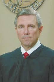 Hawk to retire from the bench