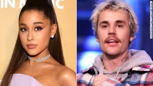 Ariana grande shares rare vacay with boyfriend dalton gomez. Ariana Grande Uses Stuck With U With Justin Bieber To Reveal New Boyfriend Cnn