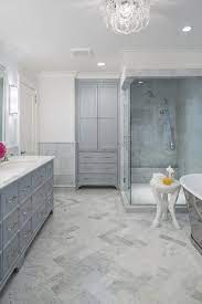 Gray marble bathroom floors herringbone wood. Honed Carrera Marble Herringbone Floor Tiles With Gray Recessed Linen Cabinet Transitional Bathroom Benjamin Moore Marina Gray