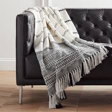 You can choose from tons of beautiful colors that can match any home décor. Jema Black And White Throw With Tassels Reviews Cb2