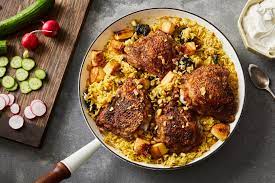 Master The Essentials Of Chicken And Rice With This One Skillet Garam Masala Chicken Thighs Saffron Rice Recip Saffron Rice Saffron Rice Recipe Masala Recipe