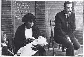 Malcolm x and muhammed ali with the malcom's daughters. Early Years Malcolm X Wife Betty Shabazz 2 Baby Daughters Malcolm X African American History American History
