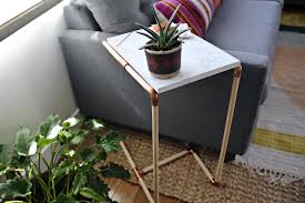 Many of the coffee tables in our guide come with storage space, ideal for hiding away living room clutter, or indeed for hiding away cocktail paraphernalia. Easy Diy Furniture How Make A C Shaped Side Table Hgtv
