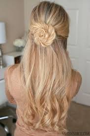 Pick a small section from the nape, twist it, and tuck it into the top twists. 20 Gorgeous Hairstyles For Long Hair Society19