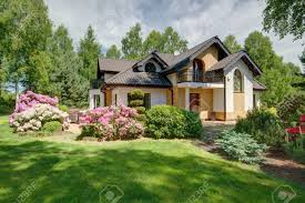 The greenery of the surrounding area is. Modern Detached House With Beautiful Garden Stock Photo Picture And Royalty Free Image Image 58219769