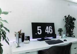 Output device desktop computers table personal computer computer hardware, table, furniture, computer table computer icons furniture living room, table, angle, white, furniture png. Black Flat Screen Computer Monitor And Black Computer Keyboard On Top Of White Table Free Stock Photo