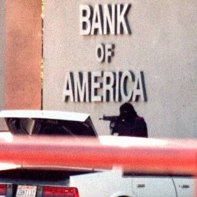 The North Hollywood shootout (1997) The North Hollywood shootout was a  violent 44-minute gun battle on February 28, 1997, between two heavily  armed and armored bank robbers, Larry Phillips Jr. and Em