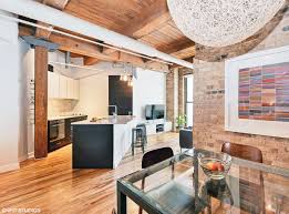 Exposed Brick Timber Ceilings And An Open Floor Plan Give This 1 Bedroom For Rent In River North Loft Lik Loft Apartment Designs Amazing Apartments Brick Loft