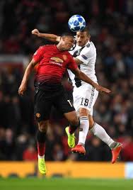 Anthony Martial Of Manchester United Competes For A Header With