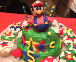 Everything is hand made and painted. Mario Birthday Cake For A 5 Year Old Boy Fondant Mario And Mushrooms Cake 5 Year Old Boy Mario Birthday Cake Mario Birthday