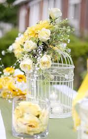 Bird Cage Decor Ideas For Weddings Pin By Nostalgia Rentals On Wedding Reception Ideas Yellow Flower Centerpieces Summer Wedding Centerpieces Bird Cage Centerpiece Wedding