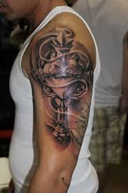 So, let now wait further and dive into this amazing collection of cross tattoo ideas and design. Barbed Wire Heart Cross Tattoo On Half Sleeve