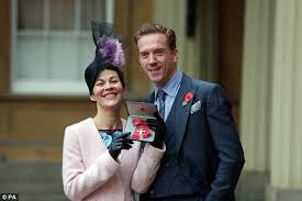 Helen mccrory rocking the red dress Helen Mccrory Beams As She Collects Her Obe Daily Mail Online