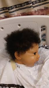 Little Greyson playing with my hair