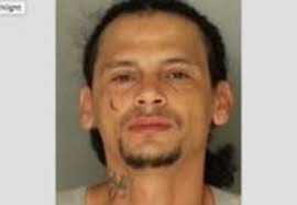 Man convicted of heroin-dealing; found with drugs, stolen gun at storage  unit