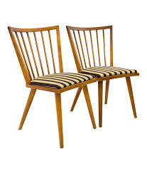 Top quality, comfortable and classy, it welcomes family and friends to sit and relax awhile. Leslie Diamond For Conant Ball Mid Century Windsor Dining Chairs Pair