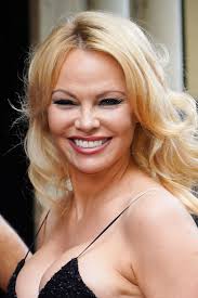 After high school, she worked as a fitness instructor until she was discovered at a. Pamela Anderson Takes Ppe To The Airport And Makes It Fashion Vanity Fair