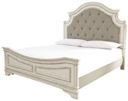 Elevating the art of traditional cottage styling, the realyn king upholstered bed is your dream bedroom retreat realized. Realyn King Upholstered Panel Bed In Chipped White