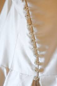 Sparkling Rhinestone Buttons Adorn The Back Of A Ramona Keveza Legends Gown Wedding Dress Buttons Rhinestone Button W Dresses